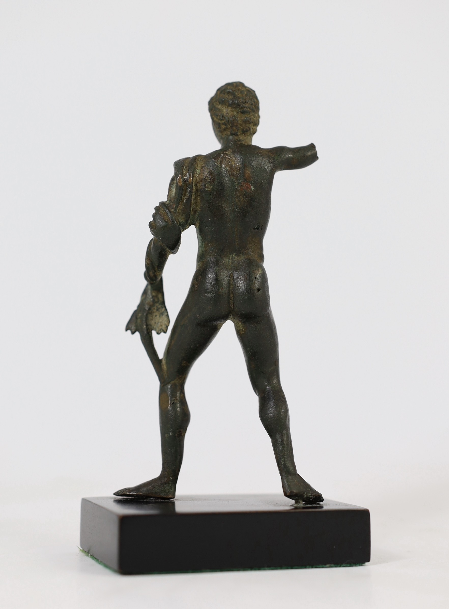 A small Roman bronze figure of Hercules, 1st century AD, 14.5cm high including later plinth